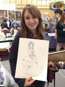 Cody & Commission Cody shows off her commission.