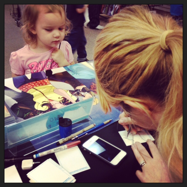 This little one waits for her Smurfette Sketch Card.